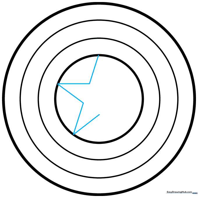Beginning to draw the star points inside the center circle.