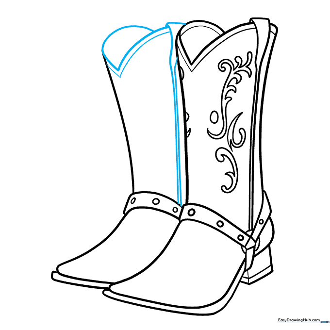 Refining the top edge of the second boot with a heart-shaped curve.