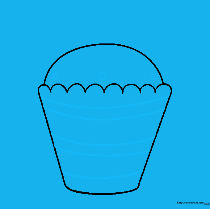 Adding vertical lines to the wrapper for texture and small shapes on the cake to represent sprinkles.