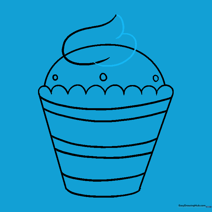 Finalizing the frosting by drawing a spiral shape that ends in a point at the top.