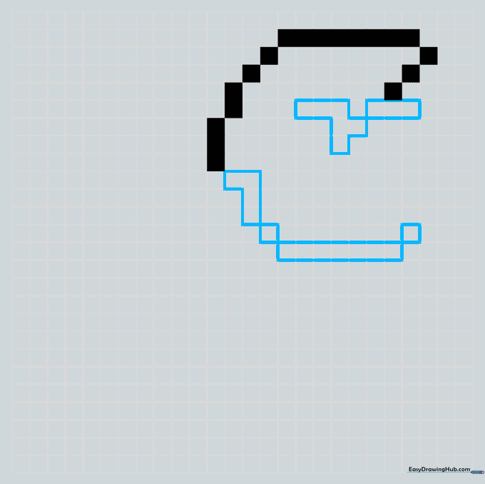 Donkey Kong pixel art showing the development of the facial features on grid paper.