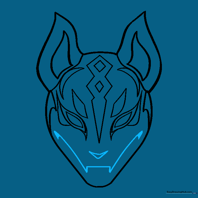 Adding the nose and mouth details to complete the face of the mask.