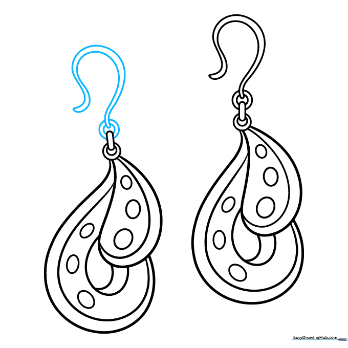 Adding the final ear hook to complete the second earring of the pair.