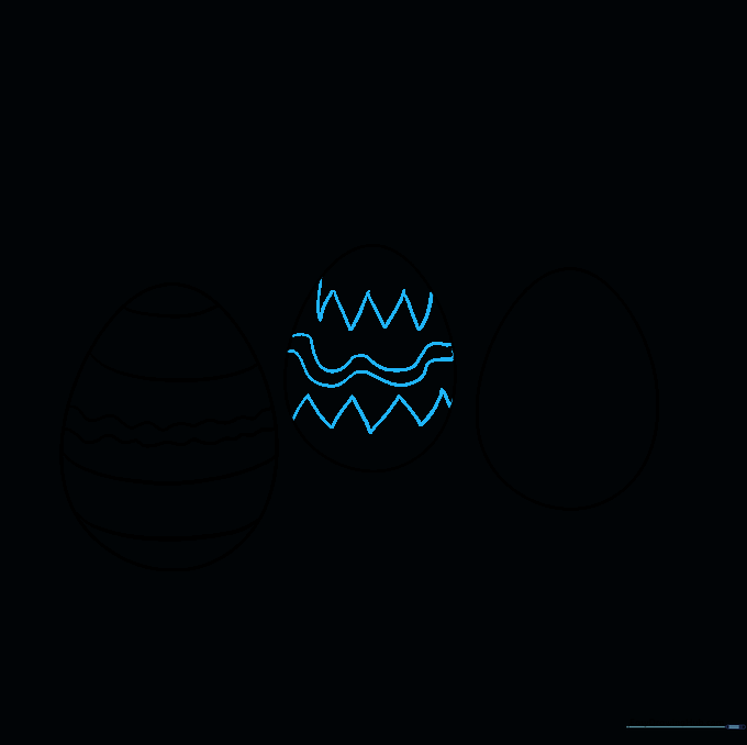 The second egg featuring a central stripe flanked by zigzag patterns.