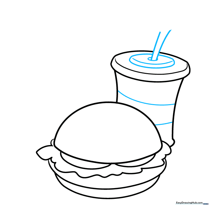 Soda cup with a straw extending from the lid.