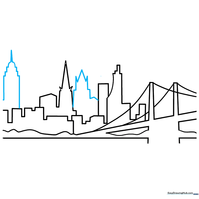 Sketching a tiered skyscraper reminiscent of the Empire State Building.