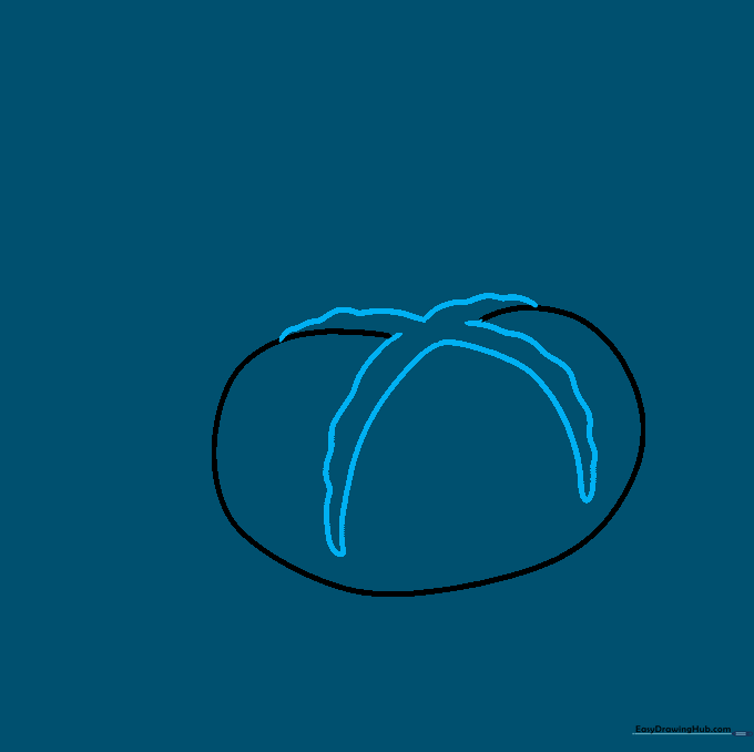 Drawing the icing cross detail on top of the bun using wavy lines.