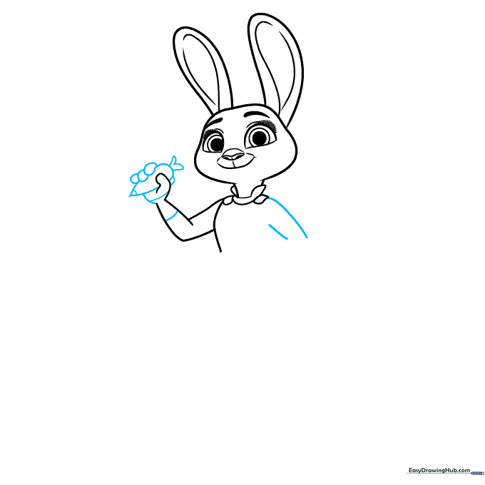 Judy Hopps holding her carrot pen, showing hand and arm placement.
