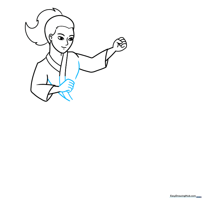 Detailed view of drawing the karate fighter's hand and sleeve folds.