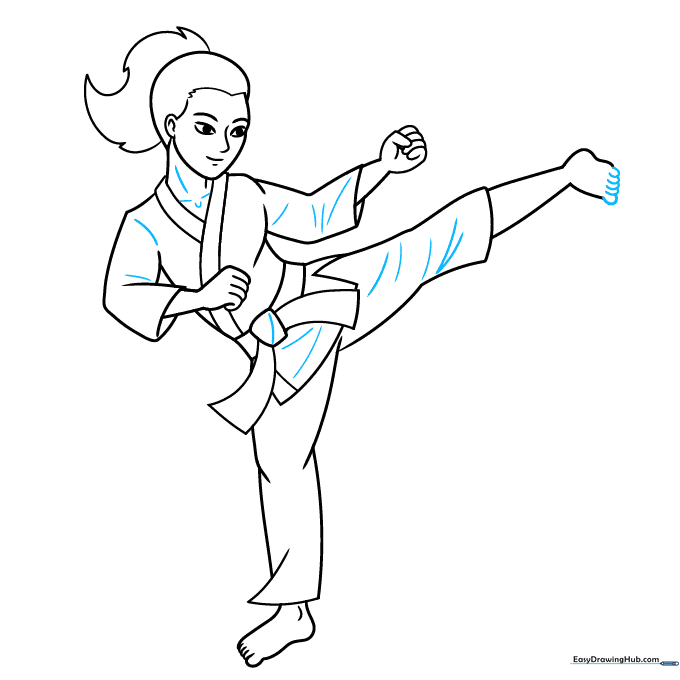 Finalizing the karate drawing with ink outlines and fabric detail lines.