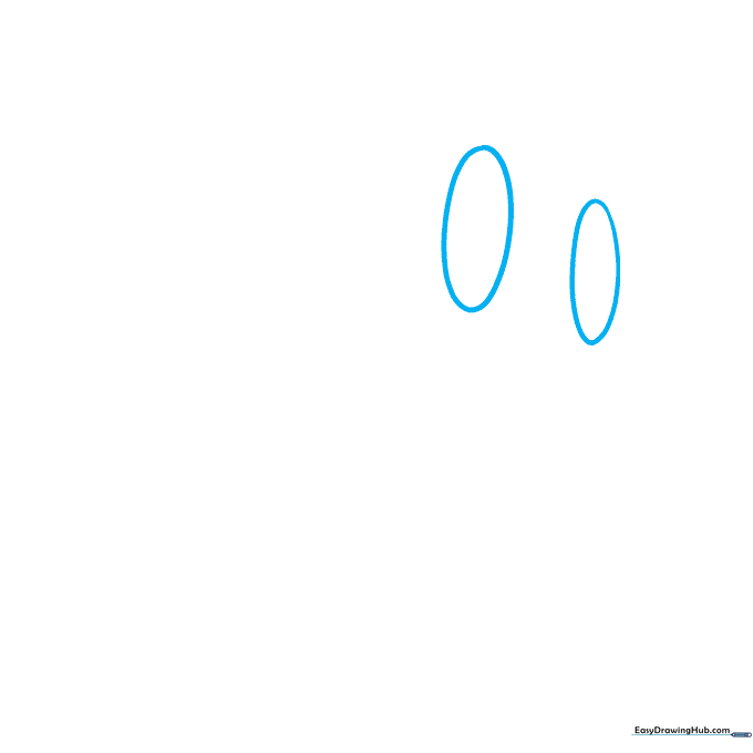 Two horizontal ovals sketched lightly on paper to form the base of Kirby's eyes.