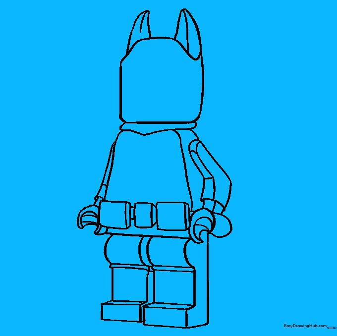 Adding facial features, the cape, and the chest logo.