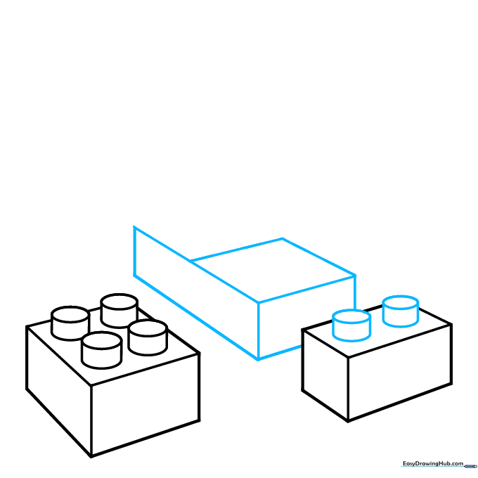 Drawing a second rectangular prism to represent a stacked Lego brick.