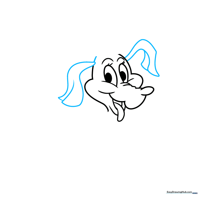 Adding long, floppy dog ears to the sides of Max's head.