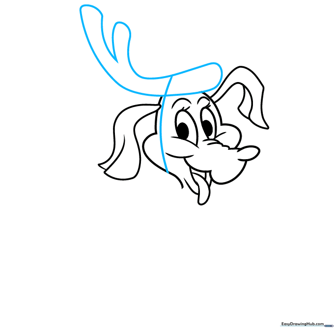 Drawing the 'Y' shaped stick on Max's head to create his reindeer disguise.