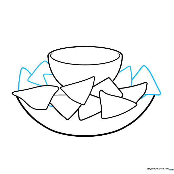 Sketching additional overlapping chip shapes to fill the plate.