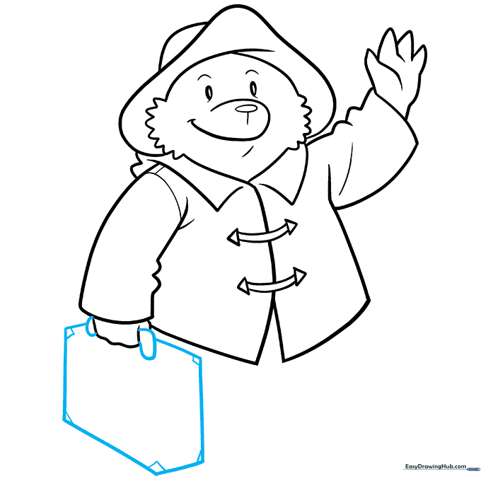 Drawing the rectangular shape of Paddington's suitcase.
