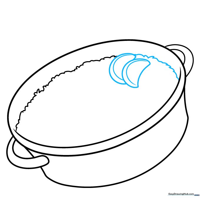 Adding two lemon wedges with rind details to the rice mixture.