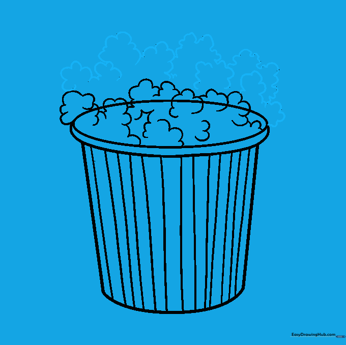 Drawing popcorn spilling over the rim of the bucket.