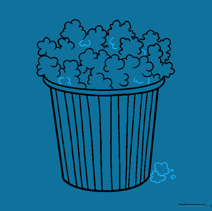 Adding final popcorn kernels and filling in gaps for a finished look.