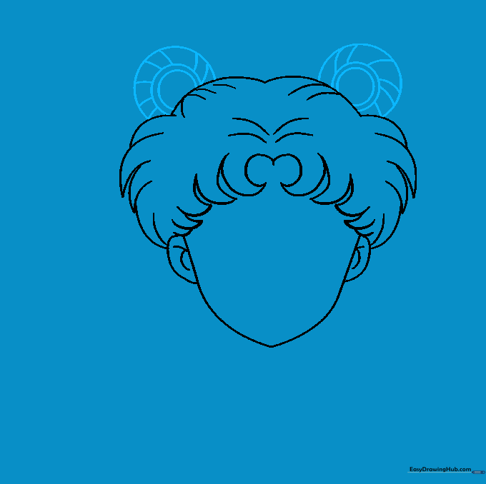 Sketching the iconic odango hair buns on the sides of Sailor Moon's head.