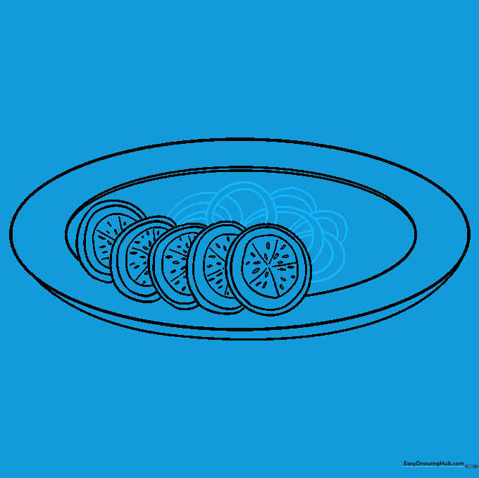 Onion slices added to the salad bowl, overlapping the existing cucumber slices.