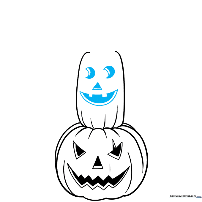 Drawing moon-shaped eyes and a nose on the middle pumpkin.