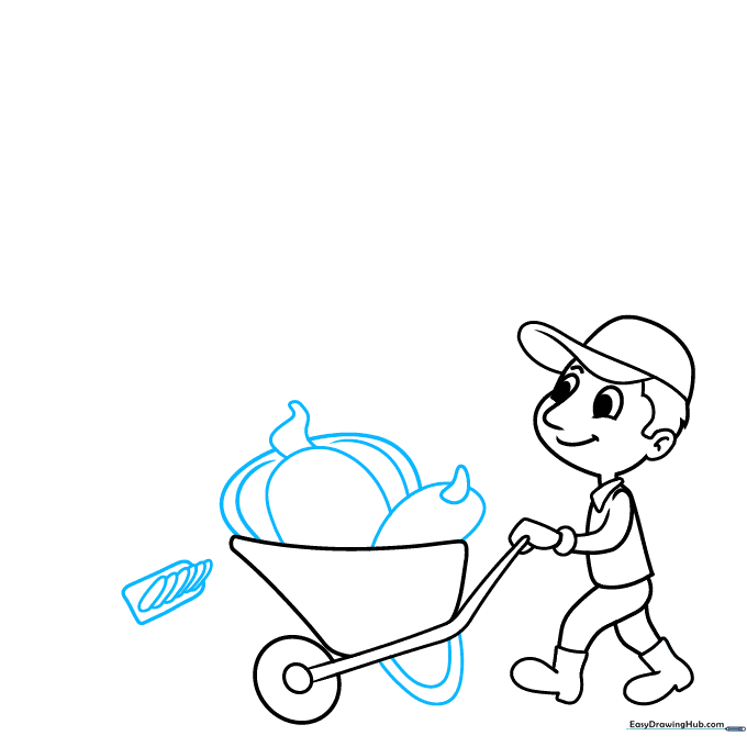 Adding pumpkins and a garden rake to the wheelbarrow in the drawing.