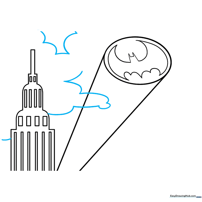 Adding fluffy cloud shapes around the searchlight beam.
