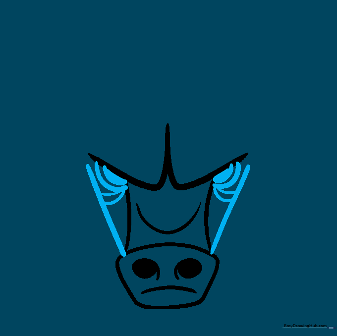 Sketching the side of the face and the bull's eyes with shaded pupils.