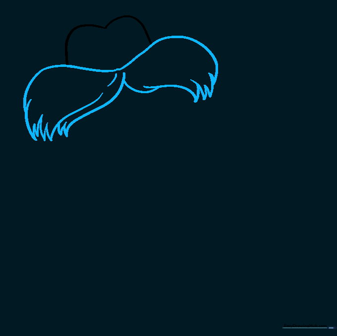 Drawing the Lorax's bushy mustache using jagged, curved lines beneath the head shape.
