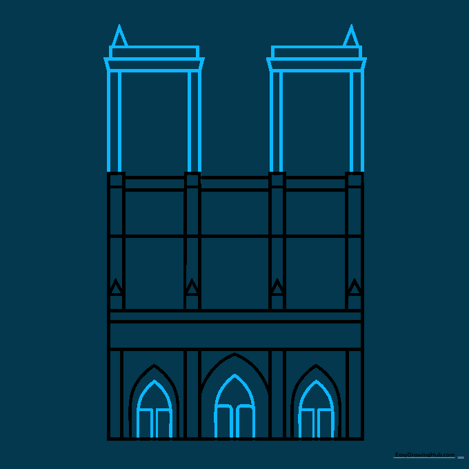 Detailing the gothic archways and entrance doors of the cathedral.
