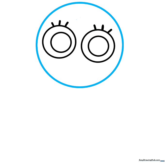 Toodles' face showing blushing cheek circles and a wide, toothy crescent smile.